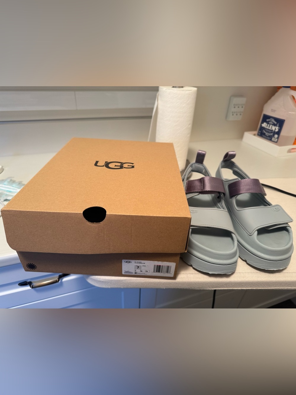UGG GoldenGlow Sandals in a light grey-blue shade featuring chunky platform 7